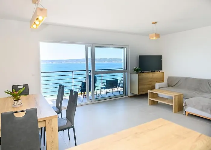 Stunning Beachfront Apartment With Roof Terrace